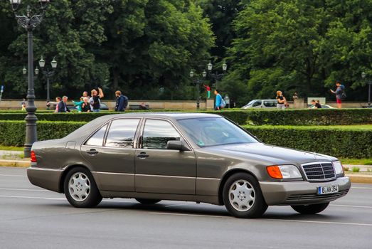 BERLIN, GERMANY - AUGUST 15, 2014: Motor car Mercedes-Benz W140 S-class at the city street.