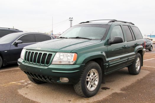 UFA, RUSSIA - APRIL 19, 2012: Motor car Jeep Grand Cherokee at the used cars trade center.