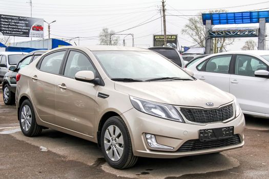 UFA, RUSSIA - APRIL 19, 2012: Motor car Kia Rio at the used cars trade center.