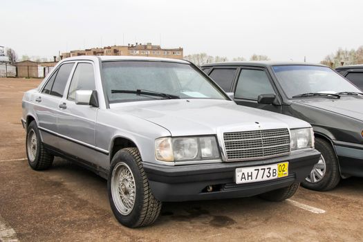 UFA, RUSSIA - APRIL 19, 2012: Motor car Mercedes-Benz W201 190E at the used cars trade center.