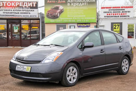 UFA, RUSSIA - APRIL 19, 2012: Motor car Toyota Prius at the used cars trade center.