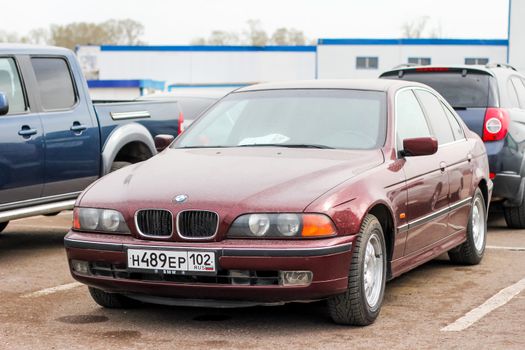 UFA, RUSSIA - APRIL 19, 2012: Motor car BMW E39 5-series at the used cars trade center.