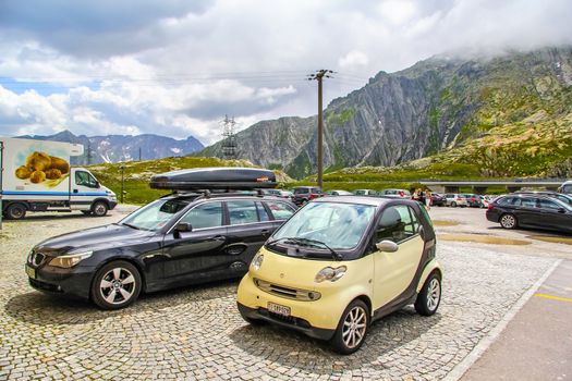 GOTTHARD PASS, SWITZERLAND - AUGUST 5, 2014: Motor car Smart Fortwo at the high Alpine mountain road.