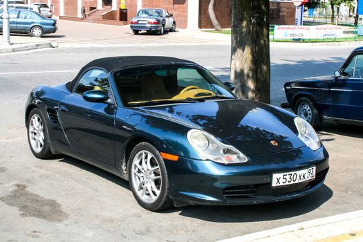 SOCHI, RUSSIA - JULY 25, 2009: Motor car Porsche 986 Boxster at the city street.