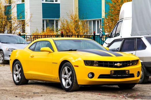 NOVYY URENGOY, RUSSIA - SEPTEMBER 9, 2012: Motor car Chevrolet Camaro at the city street.