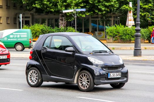 BERLIN, GERMANY - SEPTEMBER 10, 2013: Motor car Smart Fortwo at the city street.