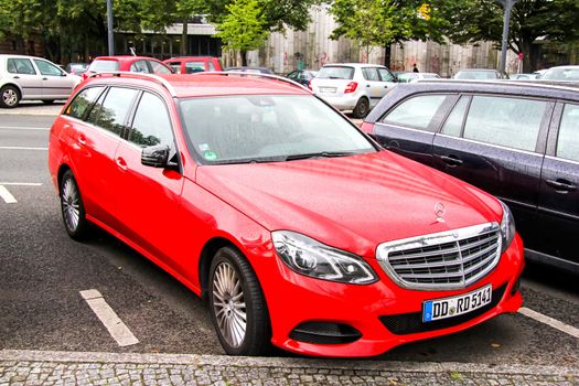 BERLIN, GERMANY - SEPTEMBER 10, 2013: Motor car Mercedes-Benz S212 E-class at the city street.