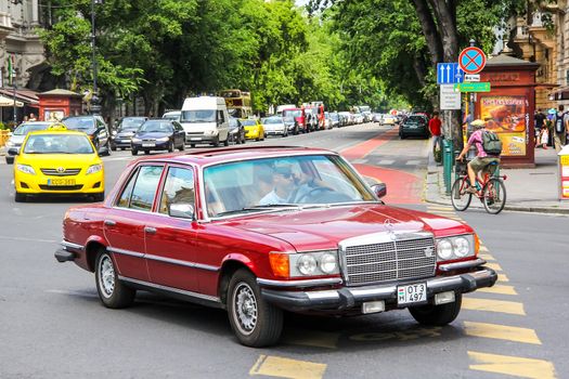 BUDAPEST, HUNGARY - JULY 23, 2014: Motor car Mercedes-Benz W126 S-class at the city street.