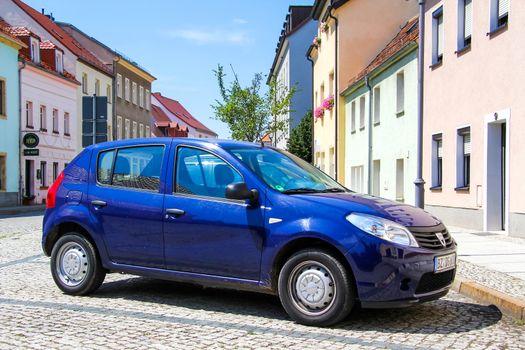 KOENIGSBRUECK, GERMANY - JULY 20, 2014: Motor car Dacia Sandero at the town street.