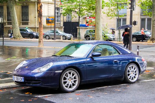 PARIS, FRANCE - AUGUST 8, 2014: Motor car Porsche 986 Boxster at the city street.