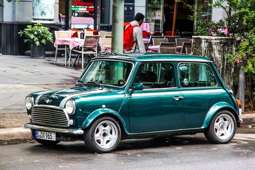 BERLIN, GERMANY - AUGUST 16, 2014: Motor car Mini Cooper at the city street.