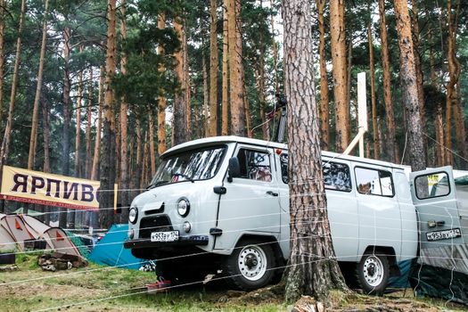 MIASS, RUSSIA - JUNE 12, 2009: Motor car UAZ 2206 in the forest.