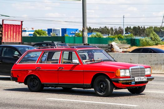 MOSCOW, RUSSIA - JUNE 2, 2012: Motor car Mercedes-Benz S123 E-class at the interurban freeway.