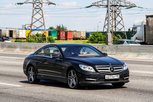 MOSCOW, RUSSIA - JUNE 2, 2012: Motor car Mercedes-Benz C216 CL-class at the interurban freeway.