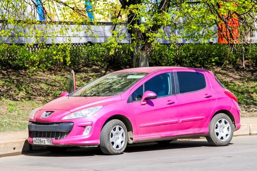 UFA, RUSSIA - APRIL 23, 2012: Motor car Peugeot 308 at the city street.