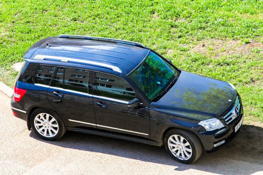 UFA, RUSSIA - APRIL 25, 2012: Motor car Mercedes-Benz X204 GLK-class at the city street.