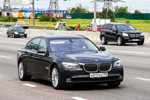 MOSCOW, RUSSIA - JUNE 2, 2012: Motor car BMW F02 7-series at the city street.