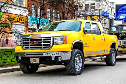 YEKATERINBURG, RUSSIA - MAY 9, 2014: Motor car GMC Sierra 2500HD at the city street.