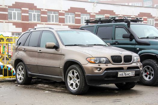 NOVYY URENGOY, RUSSIA - JUNE 8, 2014: Motor car BMW E53 X5 at the city street.