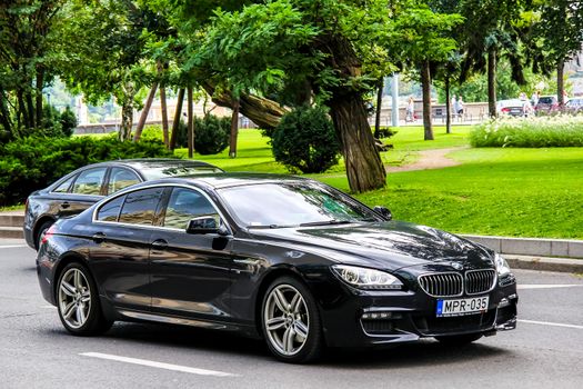 BUDAPEST, HUNGARY - JULY 23, 2014: Motor car BMW F06 6-series Gran Coupe at the city street.