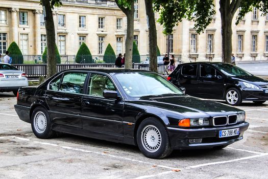 PARIS, FRANCE - AUGUST 8, 2014: Motor car BMW E38 7-series at the city street.