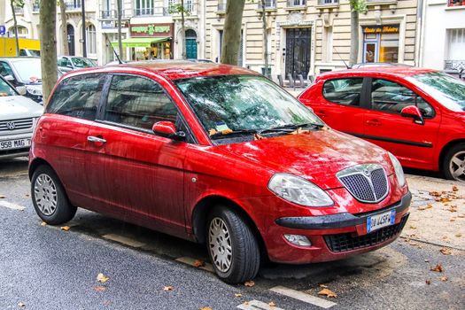 PARIS, FRANCE - AUGUST 8, 2014: Motor car Lancia Ypsilon at the city street.