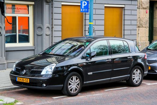 ROTTERDAM, NETHERLANDS - AUGUST 9, 2014: Motor car Renault Vel Satis at the city street.