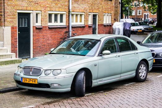 AMSTERDAM, NETHERLANDS - AUGUST 10, 2014: Motor car Rover 75 at the city street.