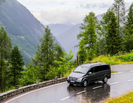 TYROL, AUSTRIA - JULY 29, 2014:  Black luxury van Mercedes-Benz W639 Vito at the Grossglockner High Alpine road.