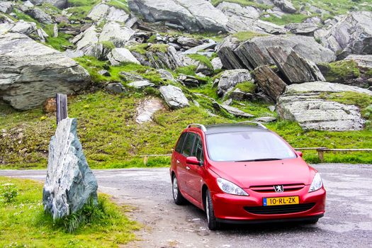 TYROL, AUSTRIA - JULY 29, 2014: Motor car Peugeot 307SW at the Grossglockner High Alpine road.