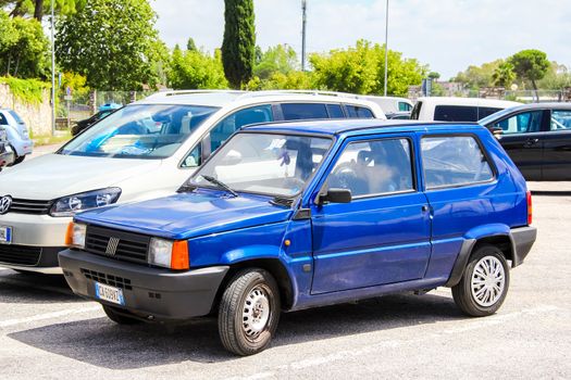 PISA, ITALY - JULY 31, 2014: Motor car Fiat Panda at the city street.