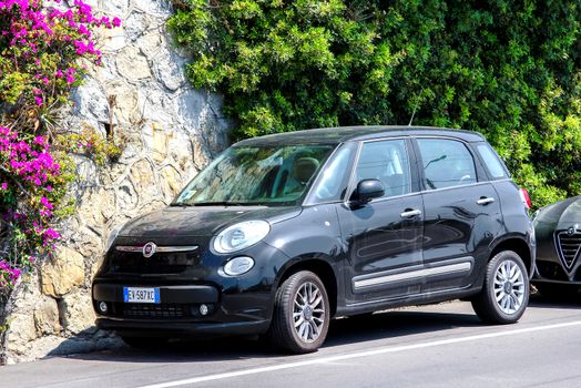 RIVIERA, FRANCE - AUGUST 2, 2014: Motor car Fiat 500L at the city street.