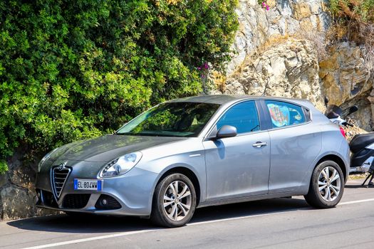 RIVIERA, FRANCE - AUGUST 2, 2014: Motor car Alfa Romeo Giulietta at the city street.