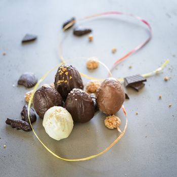 Easter eggs on wooden table. Holiday background