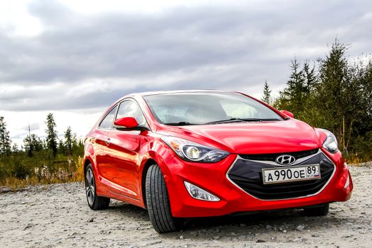 NOVYY URENGOY, RUSSIA - AUGUST 23, 2015: Motor car Hyundai Elantra at the countryside.