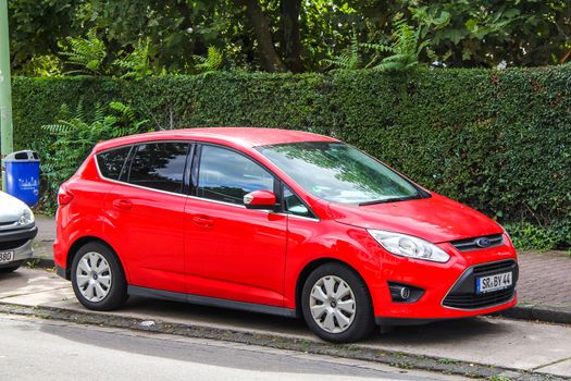 FRANKFURT AM MAIN, GERMANY - SEPTEMBER 15, 2013: Motor car Ford C-Max at the city street.