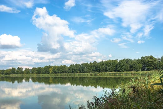 blue lake with cloudy sky, nature series