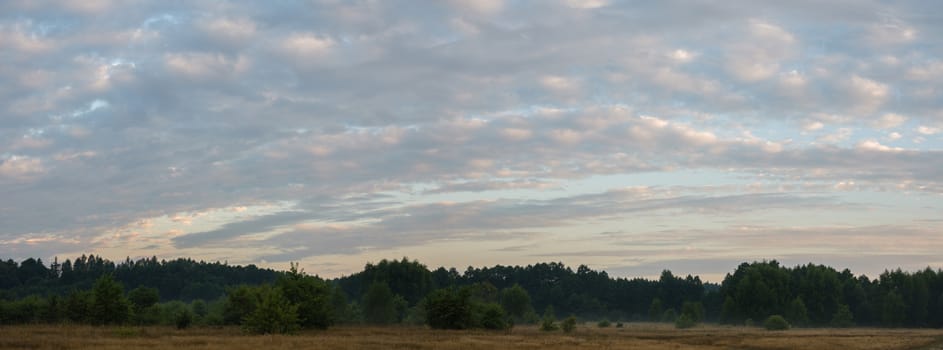 sun behind the clouds on a warm day, nature series