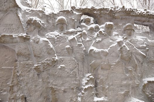 Defenders of Stalingrad, a fragment of a bas-relief of "Wall ruins" on Mamayev Kurgan in the winter