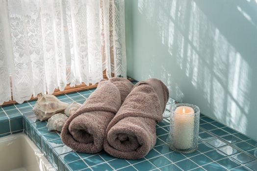 Master bath luxury towels and candle