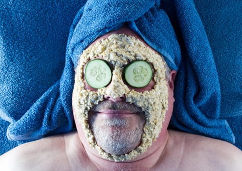 Man receiving facial at the spa