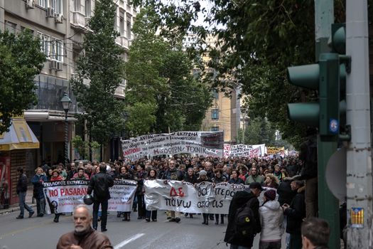 GREECE, Athens: People march down the streets as thousands demonstrate in Greece's capital city to fight against planned cuts in future benefits and increased social security contribution on January 16, 2016.  Saturday's protests in Omonia Square involves civil servants who are members of ADEDY. The unions said they are against plans for employees's social security contributions to be increased by 0.5 percent. 