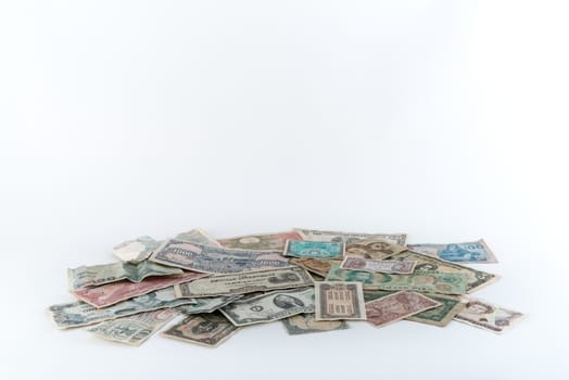 Pile of money on white background