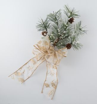 Pine Bough Decoration with Sparkly Gold Bow