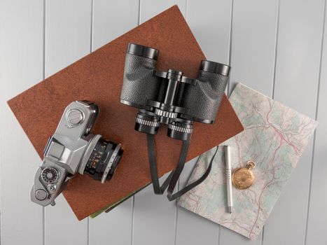 Vintage camera and binoculars still life