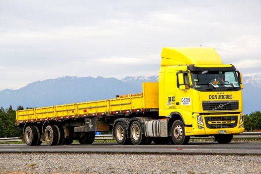 O'HIGGINS, CHILE - NOVEMBER 19, 2015: Semi-trailer truck Volvo FH12.460 at the Pan-American Highway.