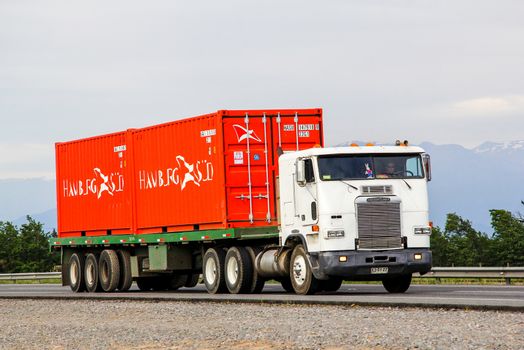 O'HIGGINS, CHILE - NOVEMBER 19, 2015: Semi-trailer truck Freightliner FLB at the Pan-American Highway.