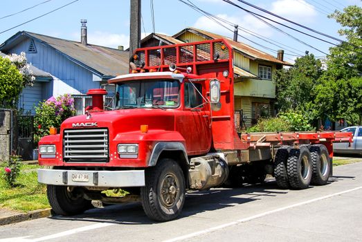 OSORNO, CHILE - NOVEMBER 21, 2015: Cargo truck Mack RD at the town street.