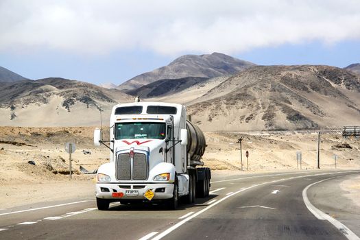 ATACAMA, CHILE - NOVEMBER 14, 2015: Semi-trailer truck Kenworth T660 at the interurban freeway through the Atacama desert.