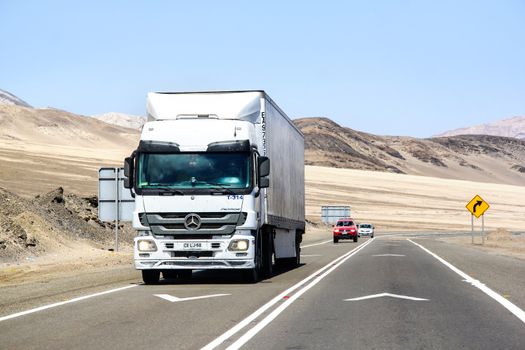 ATACAMA, CHILE - NOVEMBER 14, 2015: Semi-trailer truck Mercedes-Benz Actros at the interurban freeway through the Atacama desert.